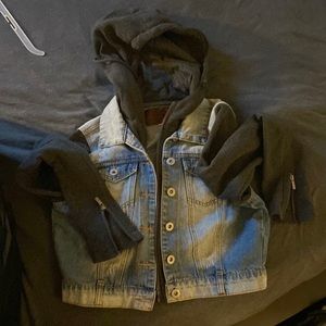 Jean Jacket with hoodie, it says XL but fits like a medium.